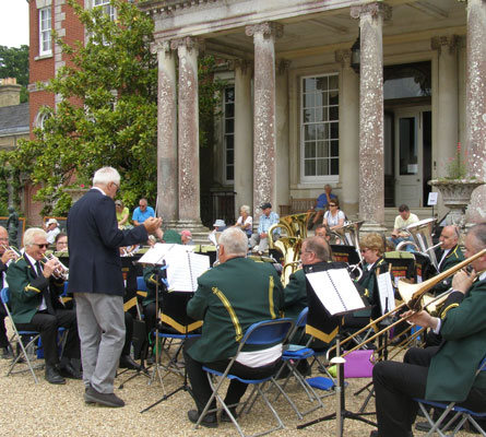 Chichester City Band performing in front of Stansted House